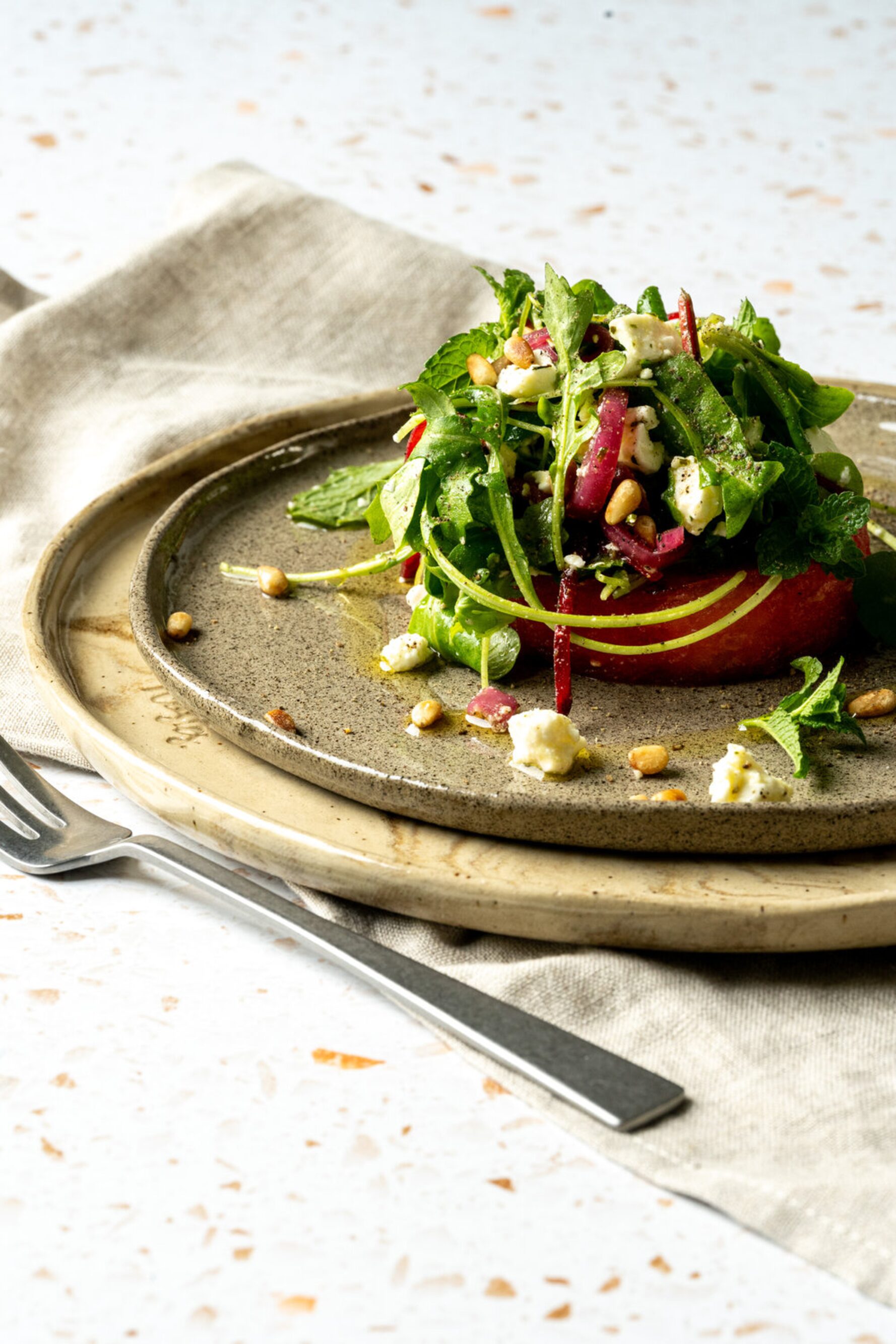 Torentje van gegrilde watermeloen met munt en feta